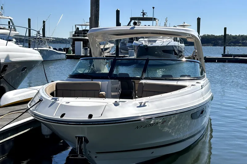  Yacht Photos Pics 2016 Sea Ray 350 SLX boat docked at marina on a sunny day.