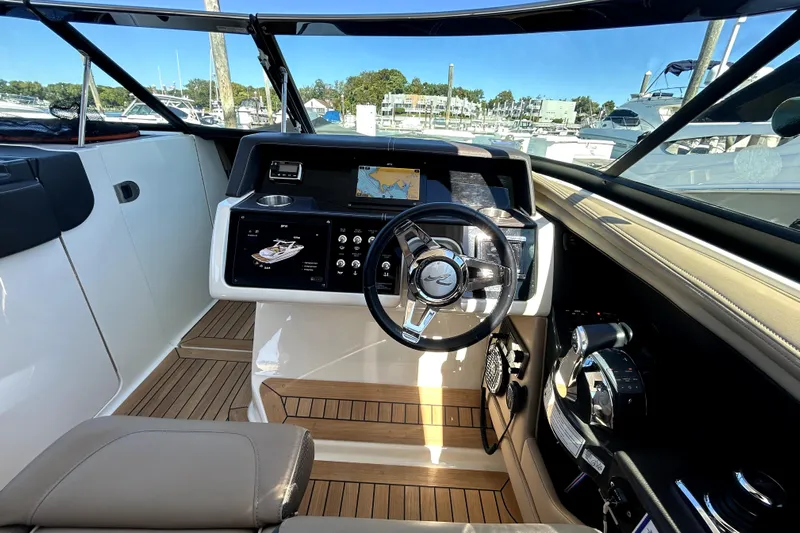  Yacht Photos Pics 2016 Sea Ray 350 SLX boat cockpit with modern controls and navigation system.
