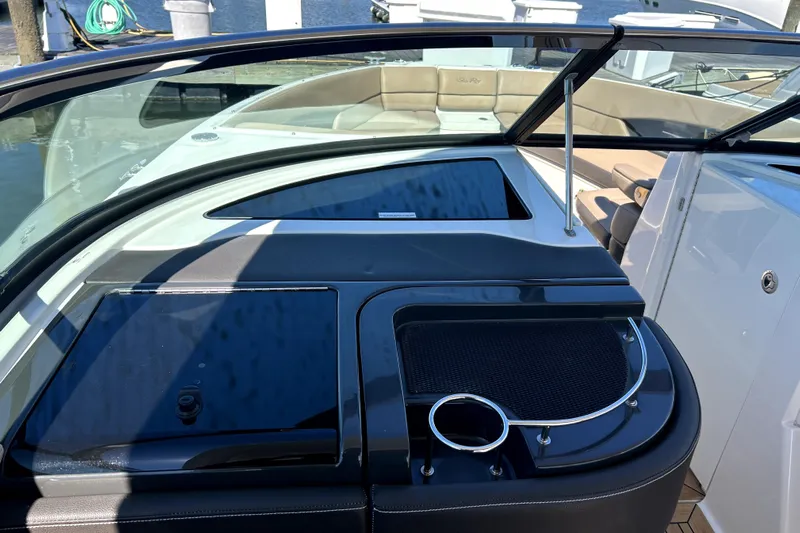  Yacht Photos Pics 2016 Sea Ray 350 SLX boat interior with seating and sleek dashboard design.