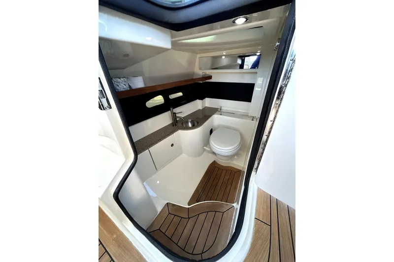  Yacht Photos Pics Luxurious 2016 Sea Ray 350 SLX boat bathroom with modern amenities and elegant design.
