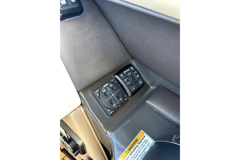  Yacht Photos Pics Control panel of a 2016 Sea Ray 350 SLX boat interior.