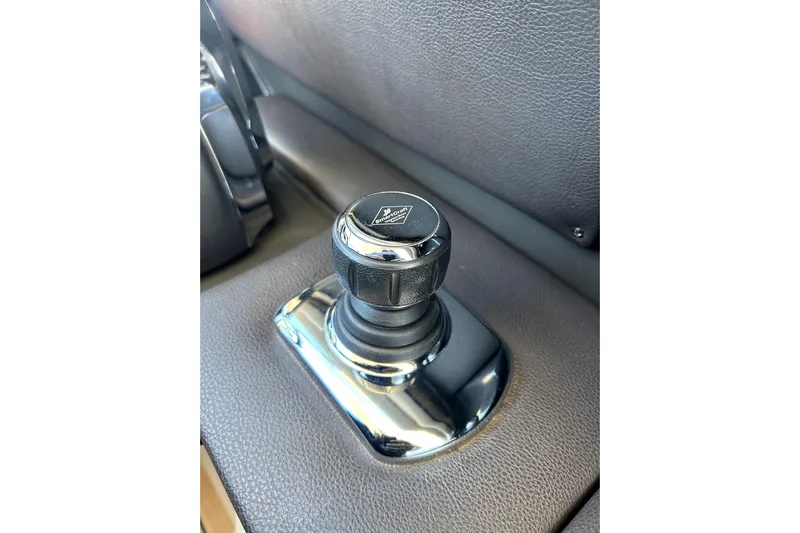  Yacht Photos Pics Close-up of joystick control in 2016 Sea Ray 350 SLX boat interior.