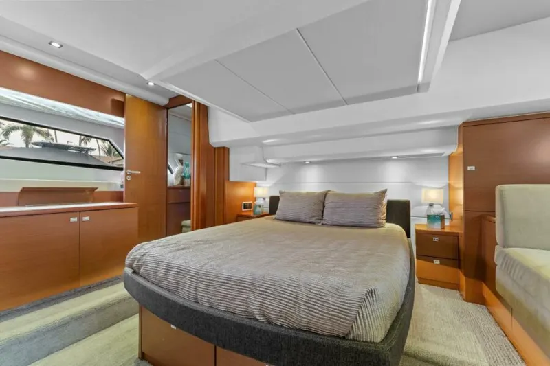 Never Enough Yacht Photos Pics Luxurious bedroom interior of 2013 Prestige 550 Flybridge yacht with modern design.