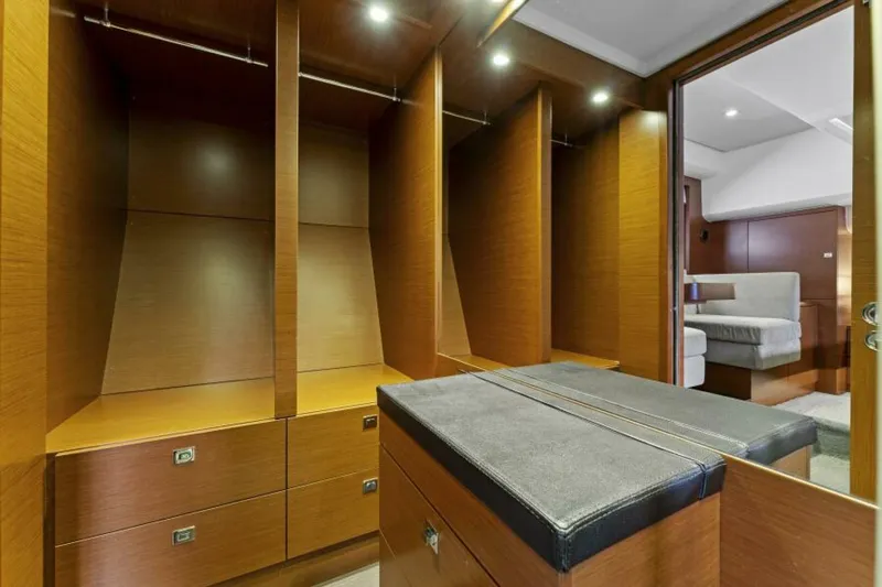 Never Enough Yacht Photos Pics Luxurious wooden closet interior on 2013 Prestige 550 Flybridge yacht.