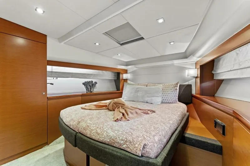 Never Enough Yacht Photos Pics Luxurious bedroom interior of 2013 Prestige 550 Flybridge yacht with modern design.