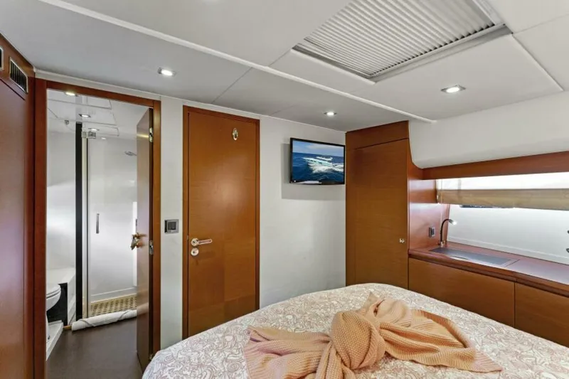 Never Enough Yacht Photos Pics Luxurious cabin interior of 2013 Prestige 550 Flybridge yacht with modern amenities.