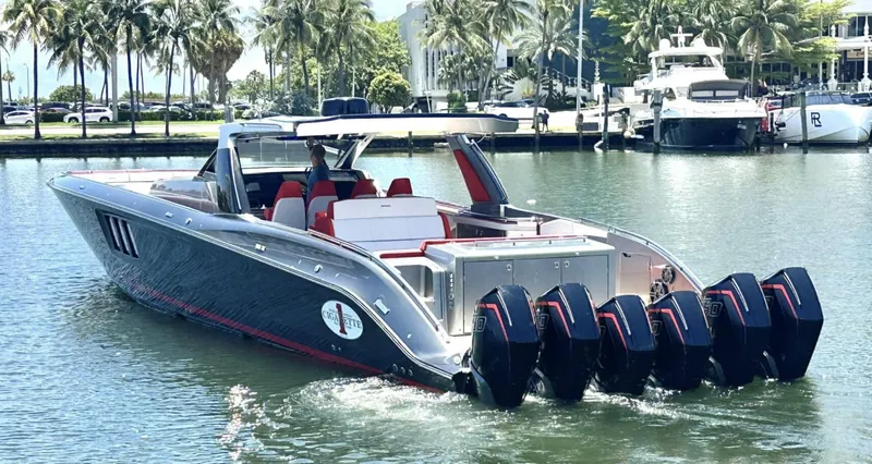  Yacht Photos Pics 2020 Cigarette 59 Tirranna luxury speedboat with six powerful outboard engines on a sunny day.