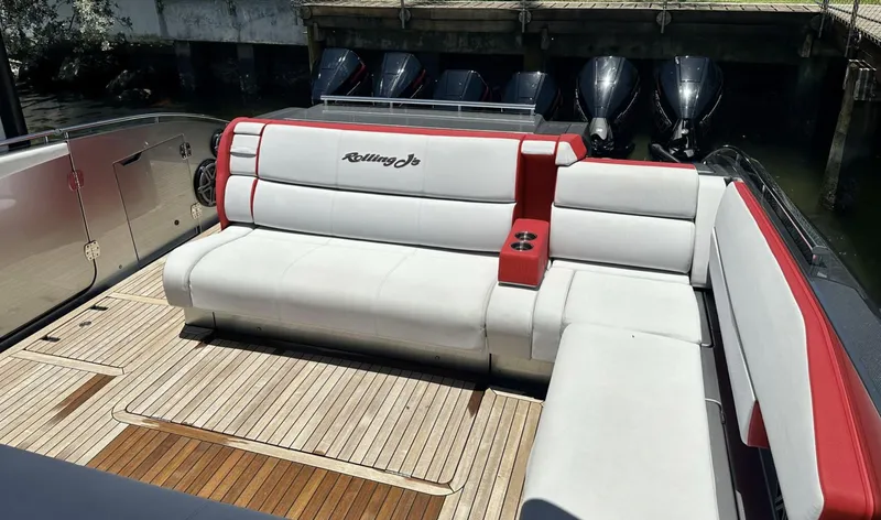  Yacht Photos Pics 2020 Cigarette 59 Tirranna luxury boat with white and red seating on teak deck.