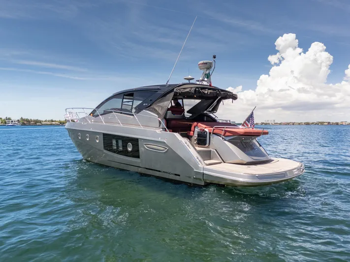  Yacht Photos Pics 2023 Cranchi M44HT yacht on blue water under clear sky.