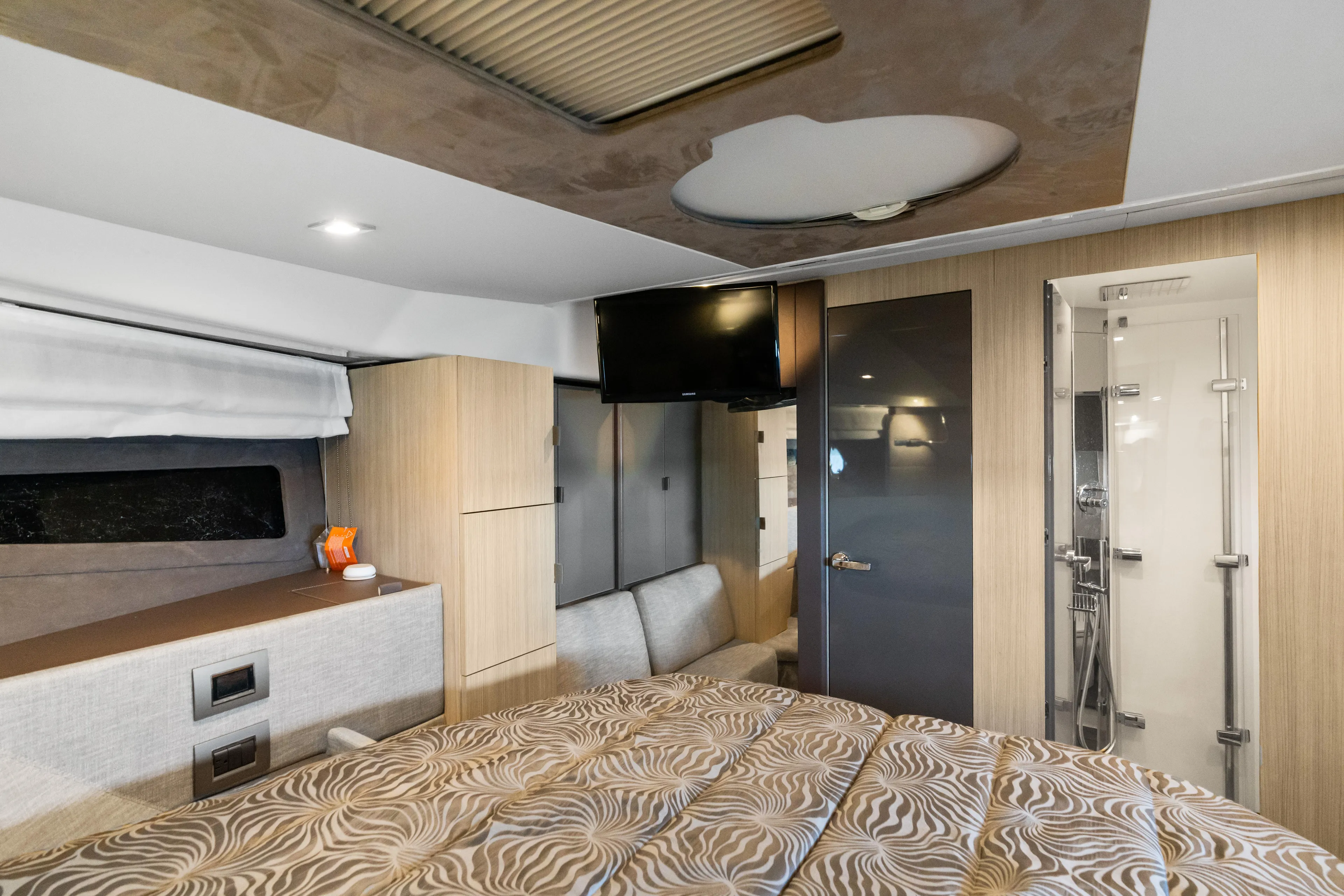  Yacht Photos Pics Luxurious interior of 2023 Cranchi M44HT yacht with modern furnishings and elegant design.