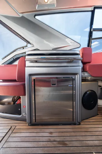  Yacht Photos Pics 2023 Cranchi M44HT yacht interior with sleek stainless steel appliances and luxurious seating.