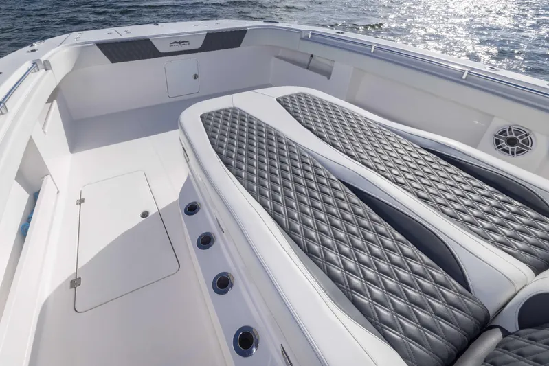  Yacht Photos Pics 2023 Invincible 35 Catamaran with luxurious diamond-stitched seating and sleek deck design.