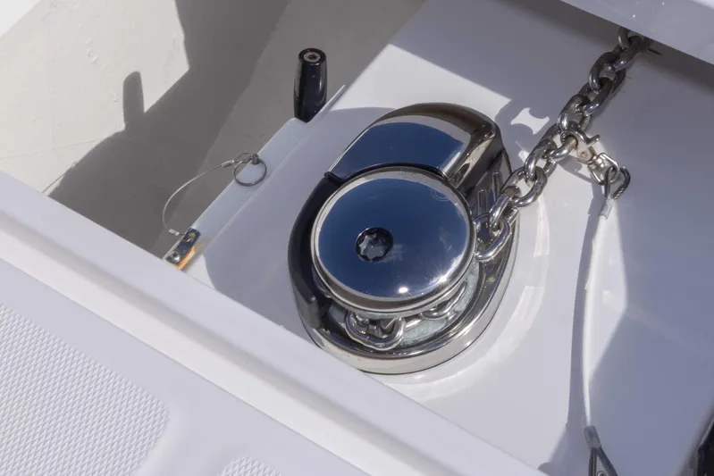  Yacht Photos Pics Anchor windlass on 2023 Invincible 35 Catamaran, showcasing marine hardware.