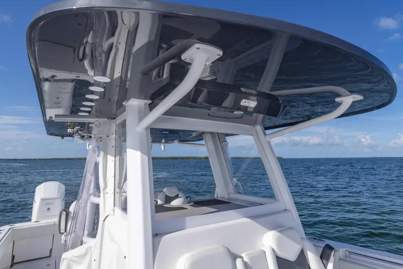  Yacht Photos Pics 2023 Invincible 35 Catamaran, sleek design, ocean view, modern helm station.