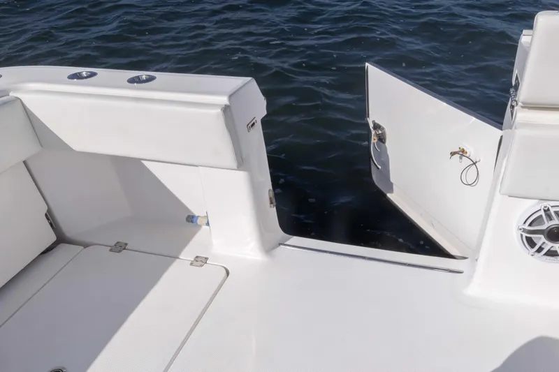  Yacht Photos Pics 2023 Invincible 35 Catamaran deck with open side door and ocean view.