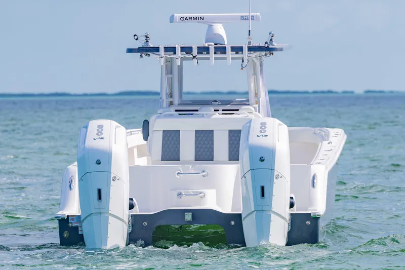  Yacht Photos Pics 2023 Invincible 35 Catamaran with twin engines on open water.