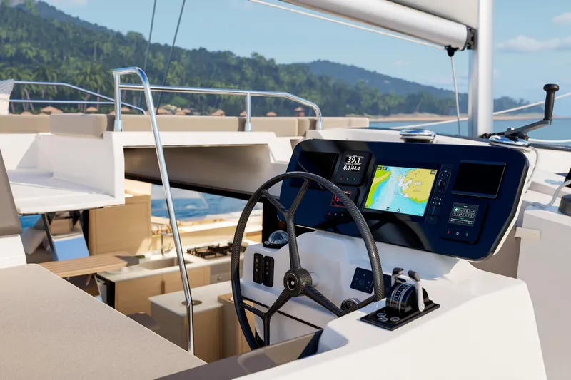  Yacht Photos Pics 2026 Fountaine Pajot FP 48 yacht helm with navigation display, tropical backdrop.