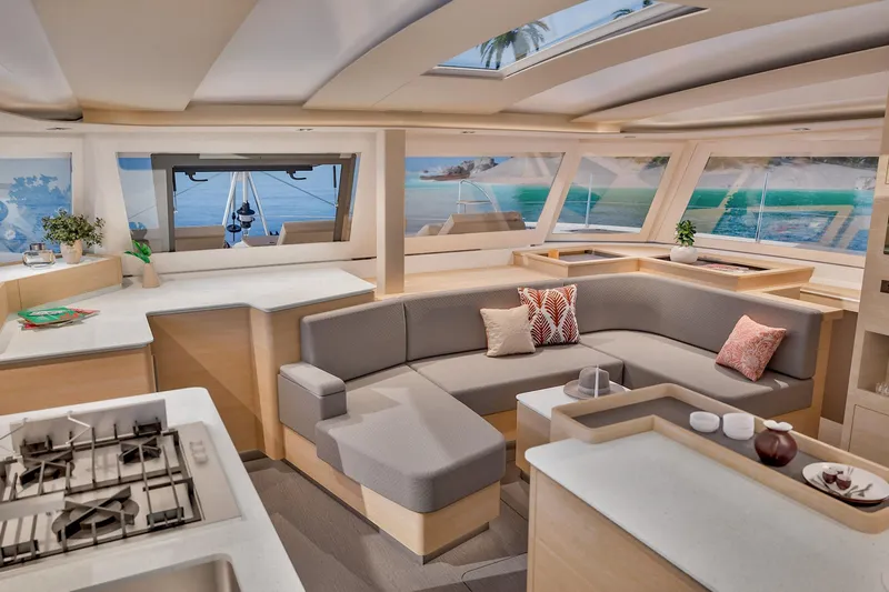  Yacht Photos Pics Luxurious interior of 2026 Fountaine Pajot FP 48 yacht with modern design and panoramic windows.