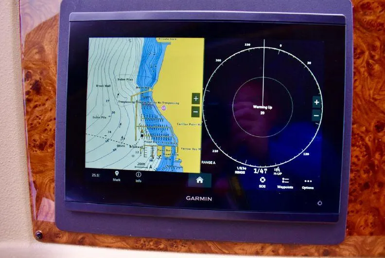 "magic" Yacht Photos Pics Garmin navigation display on 2004 Meridian 490 Pilothouse, showing map and radar interface.