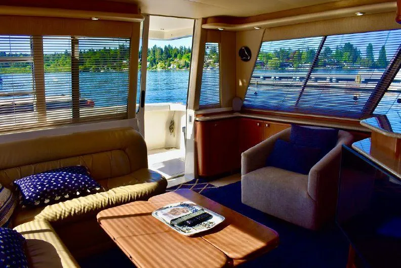 "magic" Yacht Photos Pics Luxurious interior of 2004 Meridian 490 Pilothouse yacht with scenic water views.