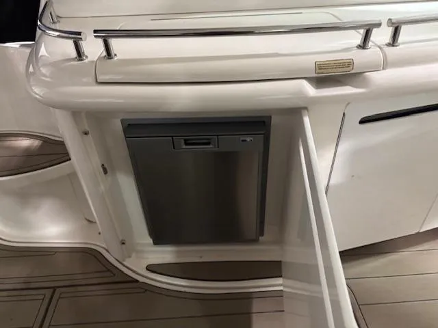 Daddy Cool Yacht Photos Pics 2008 Sea Ray 52 Sundancer yacht interior with built-in stainless steel refrigerator.