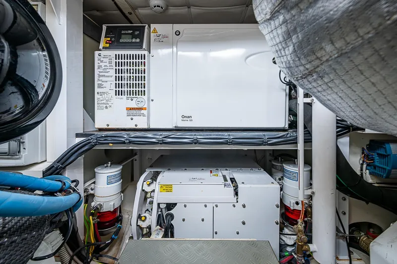  Yacht Photos Pics Engine room of 2021 Ferretti Yachts 500 with Onan generator and equipment.