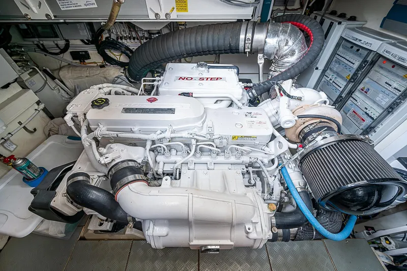  Yacht Photos Pics Engine room of 2021 Ferretti Yachts 500, showcasing advanced marine engine components.