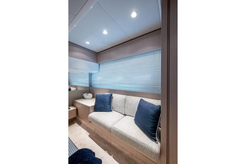  Yacht Photos Pics Luxurious interior of 2021 Ferretti Yachts 500 with cozy seating and elegant decor.
