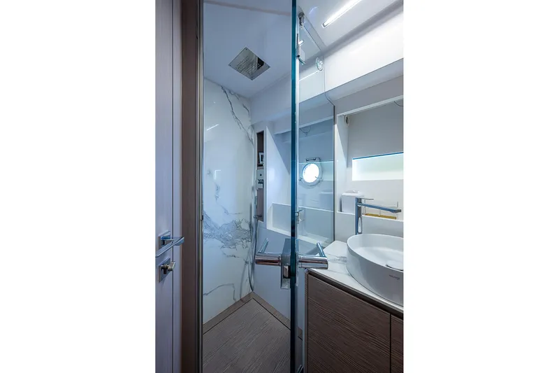  Yacht Photos Pics Luxurious bathroom interior of 2021 Ferretti Yachts 500, featuring modern fixtures and elegant design.