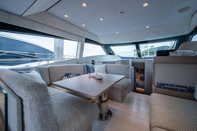  Yacht Photos Pics Luxurious interior of 2021 Ferretti Yachts 500 with elegant seating and modern design.