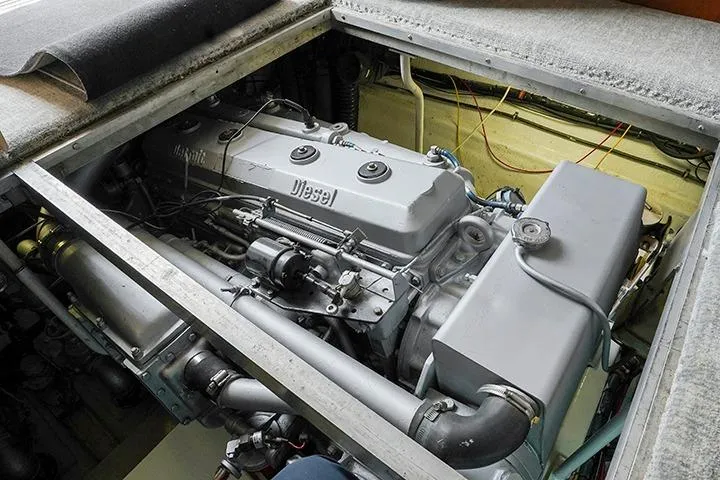 Impulse Yacht Photos Pics Engine compartment of a 1987 Viking Palm Beach boat, featuring a diesel engine.