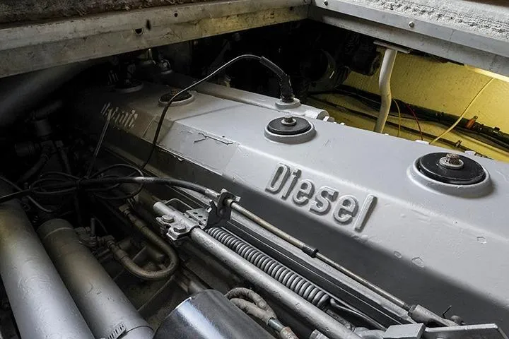 Impulse Yacht Photos Pics Engine compartment of a 1987 Viking Palm Beach boat, featuring a diesel engine.