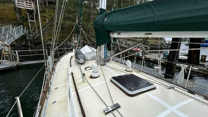  Yacht Photos Pics Sailboat deck view, Custom Seawing-Atkins 2002, docked with green sail cover.