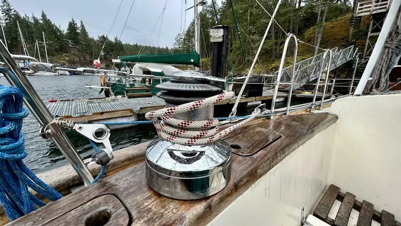  Yacht Photos Pics Sailboat deck with winch and ropes, docked in a scenic marina, Custom Seawing-Atkins 2002.