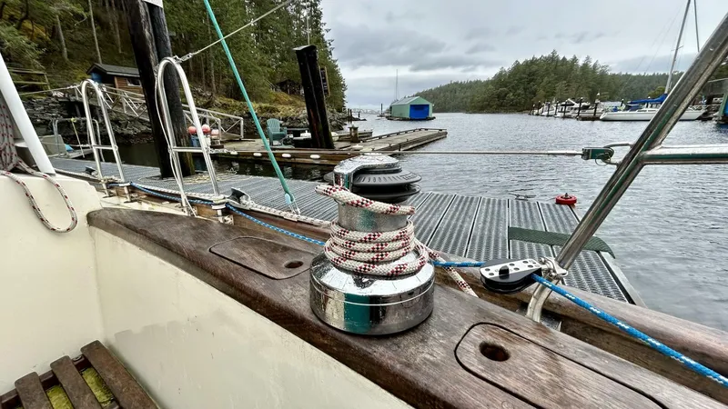  Yacht Photos Pics Sailboat deck with winch, ropes, and marina view; Custom Seawing-Atkins, 2002 model.