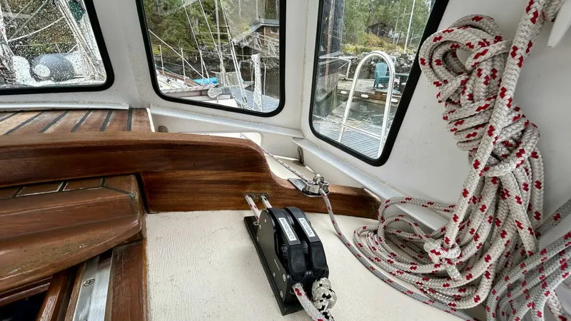  Yacht Photos Pics Interior of 2002 Custom Seawing-Atkins boat with ropes and wooden accents.