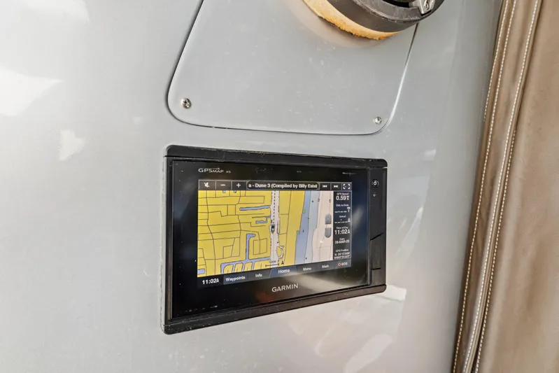Alchemy Yacht Photos Pics Garmin GPS display on 2003 Baia PANTHER 80 yacht dashboard.