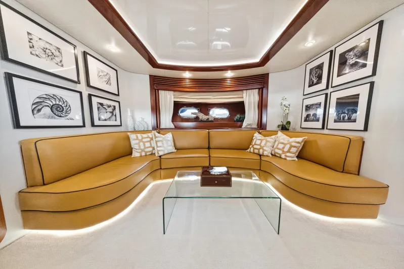 Alchemy Yacht Photos Pics Luxurious interior of 2003 Baia PANTHER 80 yacht with elegant seating and modern decor.