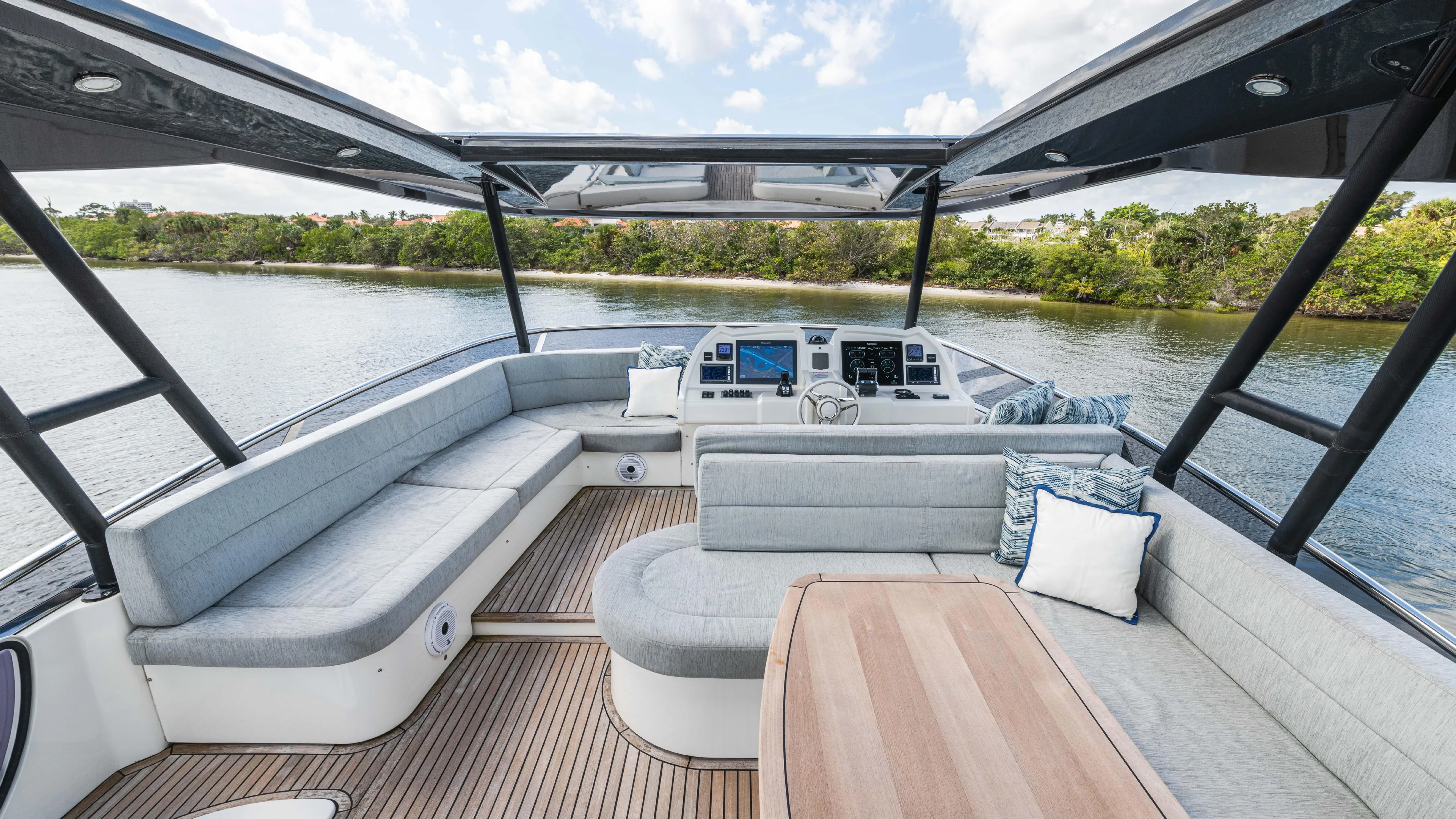 Nauti Style Yacht Photos Pics Luxurious 2016 Monte Carlo Yachts MCY 65 interior with spacious seating and elegant design.