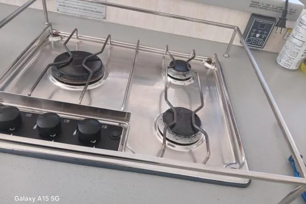Andiamo Yacht Photos Pics Stainless steel three-burner stove on Leopard 43 Powercat 2020 yacht kitchen.