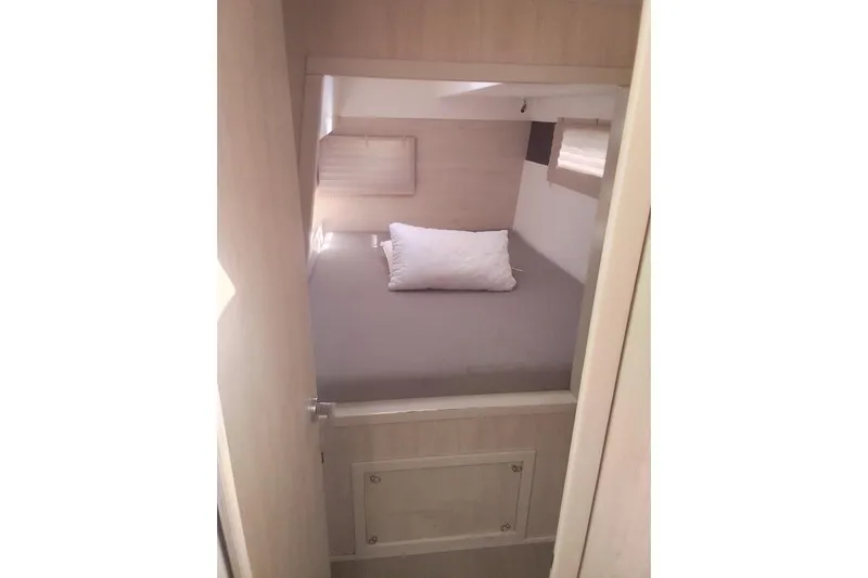 Andiamo Yacht Photos Pics Cozy bedroom interior of 2020 Leopard 43 Powercat yacht with neutral tones.