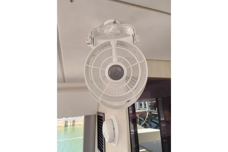 Andiamo Yacht Photos Pics Ceiling fan inside 2020 Leopard 43 Powercat yacht, providing ventilation and comfort.