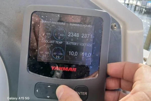 Andiamo Yacht Photos Pics Yanmar engine display on 2020 Leopard 43 Powercat showing boost pressure, running hours, and battery voltage.