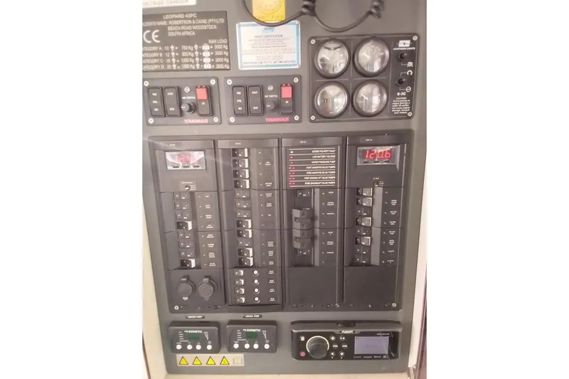Andiamo Yacht Photos Pics Electrical control panel of a 2020 Leopard 43 Powercat yacht, featuring gauges and switches.
