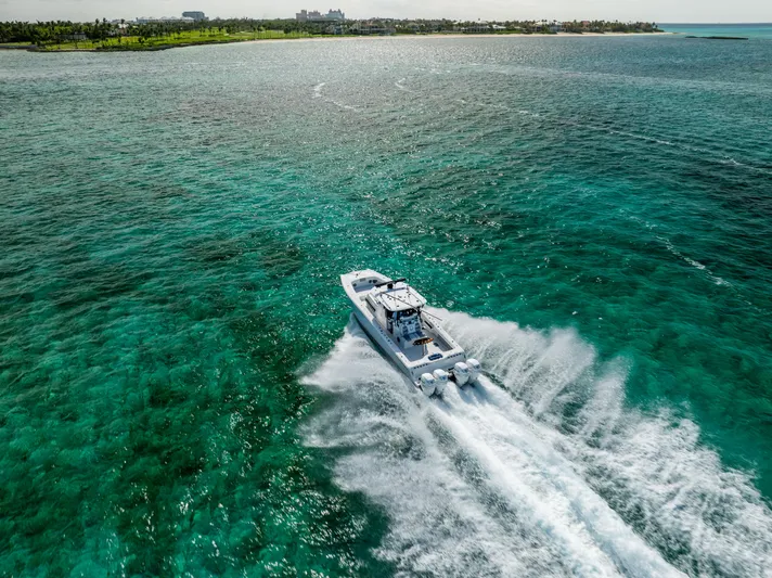 Yacht Photos Pics Freeman 37 VH boat cruising on turquoise waters, 2022 model.