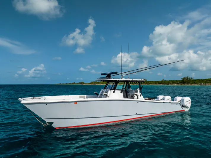  Yacht Photos Pics Freeman 37 VH 2022 boat on clear blue water under a partly cloudy sky.
