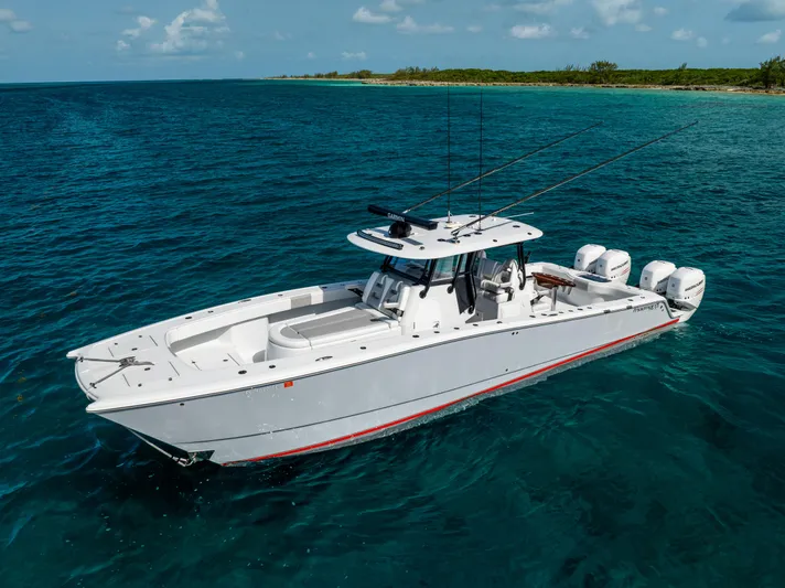  Yacht Photos Pics 2022 Freeman 37 VH boat cruising on clear blue ocean waters.