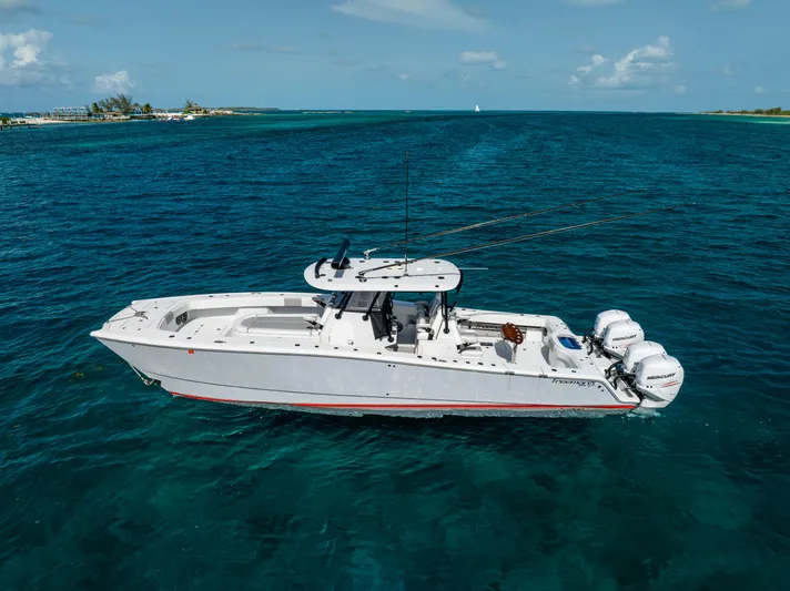  Yacht Photos Pics 2022 Freeman 37 VH boat on clear blue ocean water, side view.