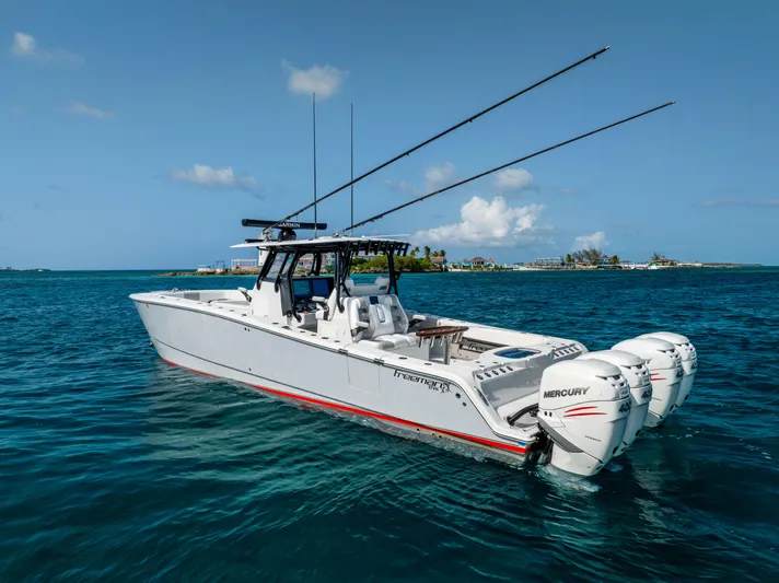  Yacht Photos Pics Freeman 37 VH 2022 boat with Mercury engines on blue ocean water.