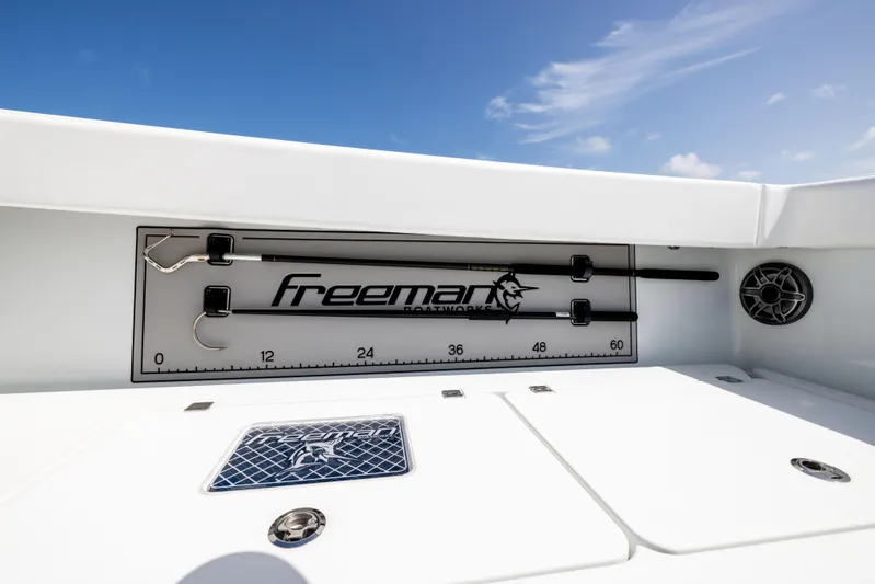  Yacht Photos Pics Freeman 37 VH 2022 boat interior with fishing rod holder and measurement scale.